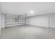 Spacious garage with sealed floor, automatic door, and utility door to the house at 623 Sandy Creek Dr, Brandon, FL 33511