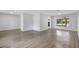 Bright and spacious living area with hard surface floors, neutral walls, and natural light from windows at 623 Sandy Creek Dr, Brandon, FL 33511