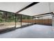 Spacious screened in patio overlooking a large backyard and mature trees at 623 Sandy Creek Dr, Brandon, FL 33511