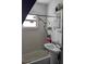 Bathroom with a shower-tub combo, updated shower head and vanity with storage at 1609 W Maki Rd, Plant City, FL 33566