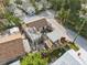 Aerial view of the property showcasing the layout, backyard patio, and convenient street access at 101 95Th Ave, Treasure Island, FL 33706