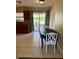 Cozy dining area near the kitchen with access to the outdoor patio at 13122 Cumberland Dr, Largo, FL 33773