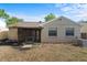 Back exterior view of home, including screened-in porch at 1904 Crown Park Dr, Valrico, FL 33594