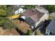 Cozy home backyard featuring a screened lanai, privacy fence and mature landscaping at 1904 Crown Park Dr, Valrico, FL 33594