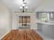 Open dining area leading to a sliding glass door and an eat-in kitchen, perfect for entertaining at 1904 Crown Park Dr, Valrico, FL 33594
