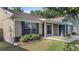 Beautiful home boasts a well-maintained lawn, complemented by vibrant landscaping and inviting curb appeal at 1904 Crown Park Dr, Valrico, FL 33594