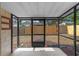 Enclosed patio area with open backyard at 1904 Crown Park Dr, Valrico, FL 33594