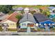 Aerial view of a charming single-story home with well-kept landscaping in a vibrant neighborhood at 2904 Sanchez St, Tampa, FL 33605