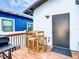 Back deck featuring outdoor seating and a grill, offering a private and relaxing outdoor area at 2904 Sanchez St, Tampa, FL 33605