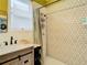 Updated bathroom features vanity with a sliding door and a modern shower at 2904 Sanchez St, Tampa, FL 33605