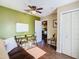 Comfortable living room and bonus room with hardwood floors, furnishings and a view at 2904 Sanchez St, Tampa, FL 33605
