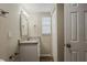 Bathroom featuring granite vanity and modern fixtures at 4812 N 37Th St, Tampa, FL 33610