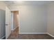 Bedroom featuring a door and trim at 4812 N 37Th St, Tampa, FL 33610