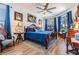 Serene primary bedroom featuring a comfortable bed, natural light, and tasteful decor, ideal for relaxation at 8721 Crystal Creek Ct, Land O Lakes, FL 34638