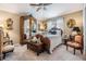 Bedroom featuring a traditional style bed, wood furnishings, neutral walls and complementary decor at 8721 Crystal Creek Ct, Land O Lakes, FL 34638