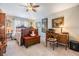 Bedroom featuring a traditional style bed, wood furnishings, neutral walls and complementary decor at 8721 Crystal Creek Ct, Land O Lakes, FL 34638