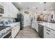 Bright kitchen with stainless steel appliances, quartz countertops, and lots of cabinet space at 8721 Crystal Creek Ct, Land O Lakes, FL 34638