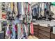 Spacious walk-in closet with ample shelving and hanging space for clothes and accessories at 8721 Crystal Creek Ct, Land O Lakes, FL 34638