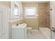 Bathroom featuring a bathtub, new vanity, mirror, and tiled floors for a clean aesthetic at 1424 14Th S St, St Petersburg, FL 33705