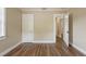 Spacious bedroom with wood flooring, ample natural light, and classic white trim at 1424 14Th S St, St Petersburg, FL 33705