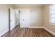 Bright bedroom with wood flooring, natural light, and neutral walls create a calming atmosphere at 1424 14Th S St, St Petersburg, FL 33705