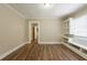Bright dining area with hardwood floors, built-in cabinets, and lots of natural light at 1424 14Th S St, St Petersburg, FL 33705