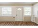 Bright entryway with hardwood floors, neutral walls, and plenty of natural light from two windows at 1424 14Th S St, St Petersburg, FL 33705