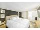 Spacious main bedroom featuring a comfortable bed, neutral tones, and ample natural light at 2356 Kingston S St, St Petersburg, FL 33711