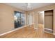 Bedroom includes wood floors, neutral paint and a closet at 738 Haven Pl, Tarpon Springs, FL 34689