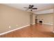 Large living room with hardwood floors at 738 Haven Pl, Tarpon Springs, FL 34689