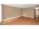 Spacious living room featuring wood floors, neutral paint, and bright natural light at 738 Haven Pl, Tarpon Springs, FL 34689