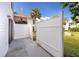 Private patio area with a fence, offering a cozy outdoor space at 738 Haven Pl, Tarpon Springs, FL 34689