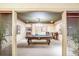 Relax and play in this game room with pool table and decorative photographs creating an entertaining space at 1064 N Tamiami Trl # 1219, Sarasota, FL 34236