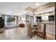 Inviting living space featuring tiled floors, combined kitchen, and a sliding door to the outside at 1064 N Tamiami Trl # 1219, Sarasota, FL 34236