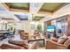 Inviting lounge area features comfortable leather seating, stylish decor, and a large television for relaxation at 1064 N Tamiami Trl # 1219, Sarasota, FL 34236