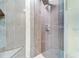 Clean and modern shower with gray tile and glass surround at 1672 Watermark Ne Cir, St Petersburg, FL 33702