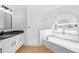 Bright bathroom features a soaking tub and granite vanity at 709 Tuscanny St, Brandon, FL 33511