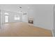 Bright living room with fireplace, wood floors and large windows for natural light at 709 Tuscanny St, Brandon, FL 33511