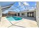 Backyard features a sparkling pool and outdoor living space at 709 Tuscanny St, Brandon, FL 33511