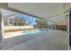 Covered lanai showcases a sparkling pool and spa at 709 Tuscanny St, Brandon, FL 33511