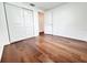 Bedroom boasts hardwood floors, closet with white doors, and a calming atmosphere at 8399 78Th N Ave, Seminole, FL 33777