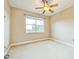 Bedroom with neutral carpet and a ceiling fan at 1408 3Rd Street E Cir, Palmetto, FL 34221