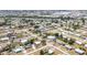 Aerial view of a quiet neighborhood with tree-lined streets and well-maintained homes at 3163 Key Ln, Port Charlotte, FL 33952