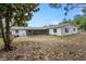 View of the house exterior and backyard at 408 Eunice Dr, Plant City, FL 33563