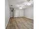 Large bedroom with wood-look floors and ample closet space at 408 Eunice Dr, Plant City, FL 33563