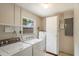 Functional laundry area featuring modern washer and dryer at 408 Eunice Dr, Plant City, FL 33563