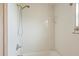 Bright bathroom shower features a clean, tiled surround and modern shower head at 408 Eunice Dr, Plant City, FL 33563