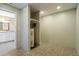 Utility room with water heater and open storage space at 408 Eunice Dr, Plant City, FL 33563