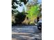 Charming home with a driveway, surrounded by mature trees at 820 Bayou Ave, Tarpon Springs, FL 34689