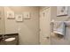 Bathroom featuring artistic decor and granite countertop sink at 2668 Jablo Cir, North Port, FL 34288